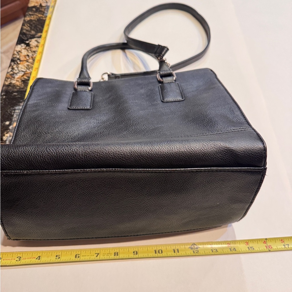 Spacious Black Leather Tote with Adjustable Strap